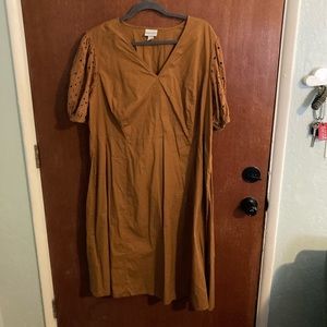 Mustard color midi dress with puff sleeves